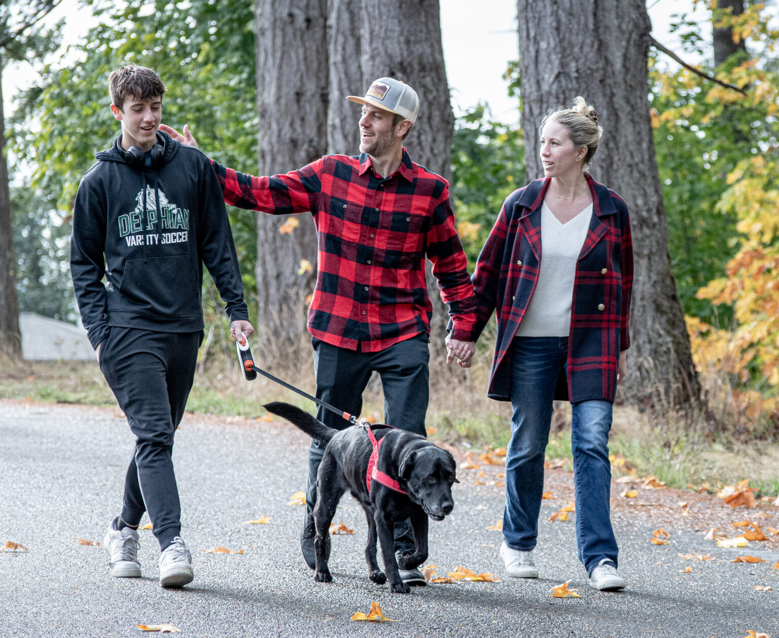 Jason Wydro walking with his family and their dog in McMinnville, Oregon