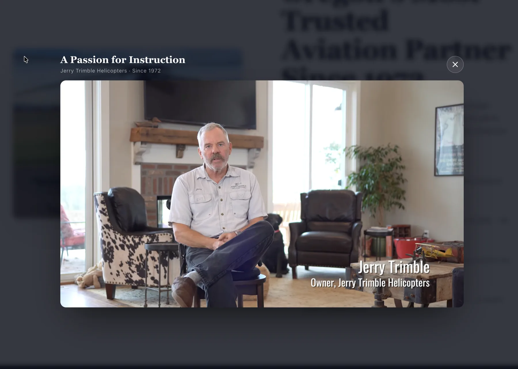 An in-page video player lets prospective students experience the flight-school story without leaving the site.